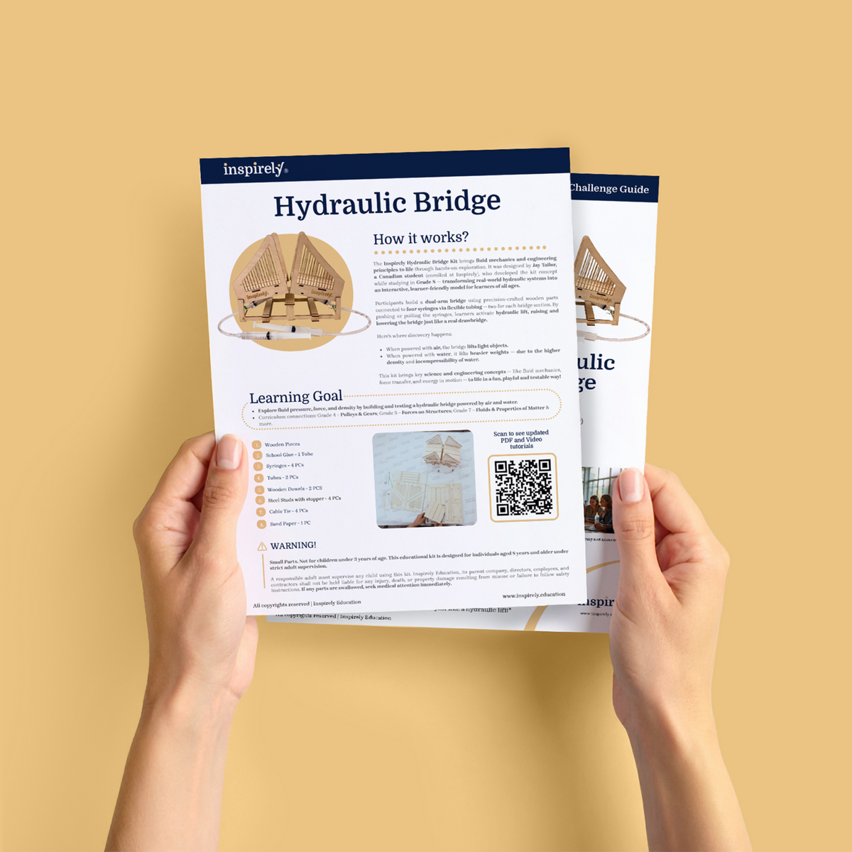 Inspirely Hydraulic Bridge printed project and challenge guide with learning goals and access to build tutorials.